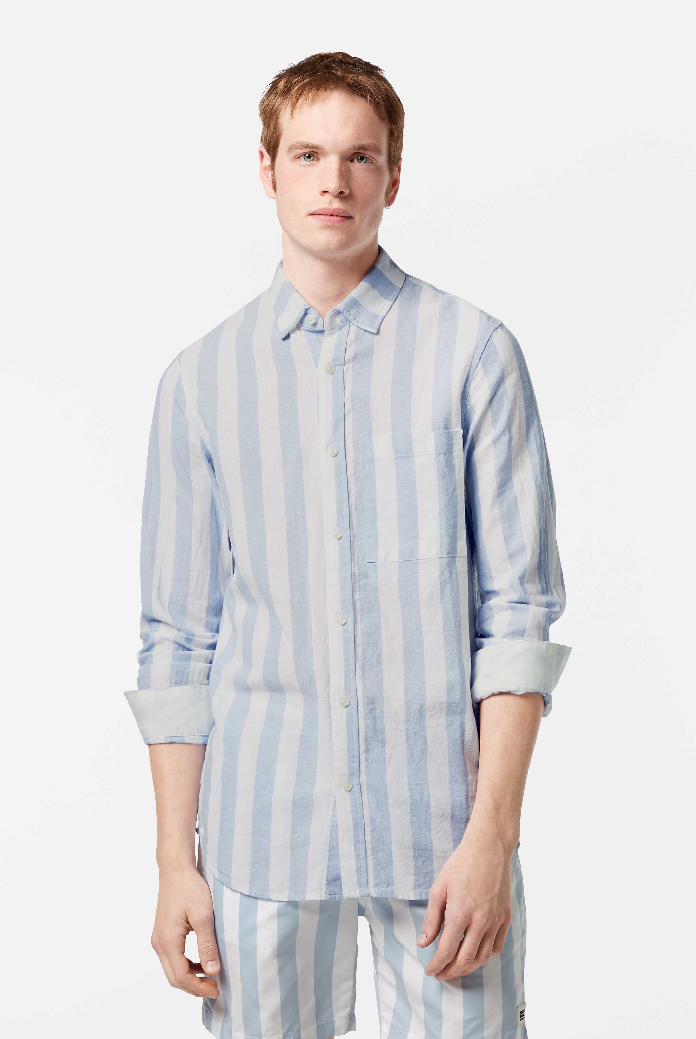 This lightweight long-sleeved seersucker shirt features classic stripes and a textured finish, blending comfort with effortless style.
100% Cotton
Regular fit