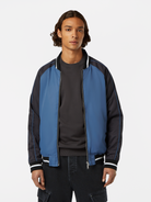 Reversible and ready to switch up your style, this bomber jacket offers two distinct looks. One side features a bold print, while the other showcases a sleek, solid colour, giving you effortless versatility for any occasion.

100% Polyester

Regular fit