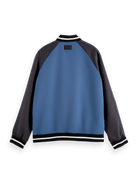 Reversible and ready to switch up your style, this bomber jacket offers two distinct looks. One side features a bold print, while the other showcases a sleek, solid colour, giving you effortless versatility for any occasion.

100% Polyester

Regular fit