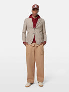 Crafted from a breathable cotton-linen blend, this yarn-dyed blazer delivers timeless style with a relaxed, tailored fit.

81% Cotton, 19% Linen